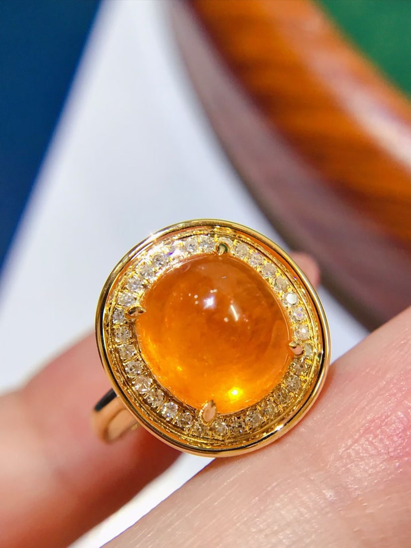 14k Gold 6.8 Ct Natural Spessartine & Diamond Ring: Ref:231172387 // gold content:14k gold // ring size:7. 25us // // main gemstone:spessartine // shape:oval // carat weight:6. 8ct // color:orange // treatment:natural // // adjacent gemstone 2 :