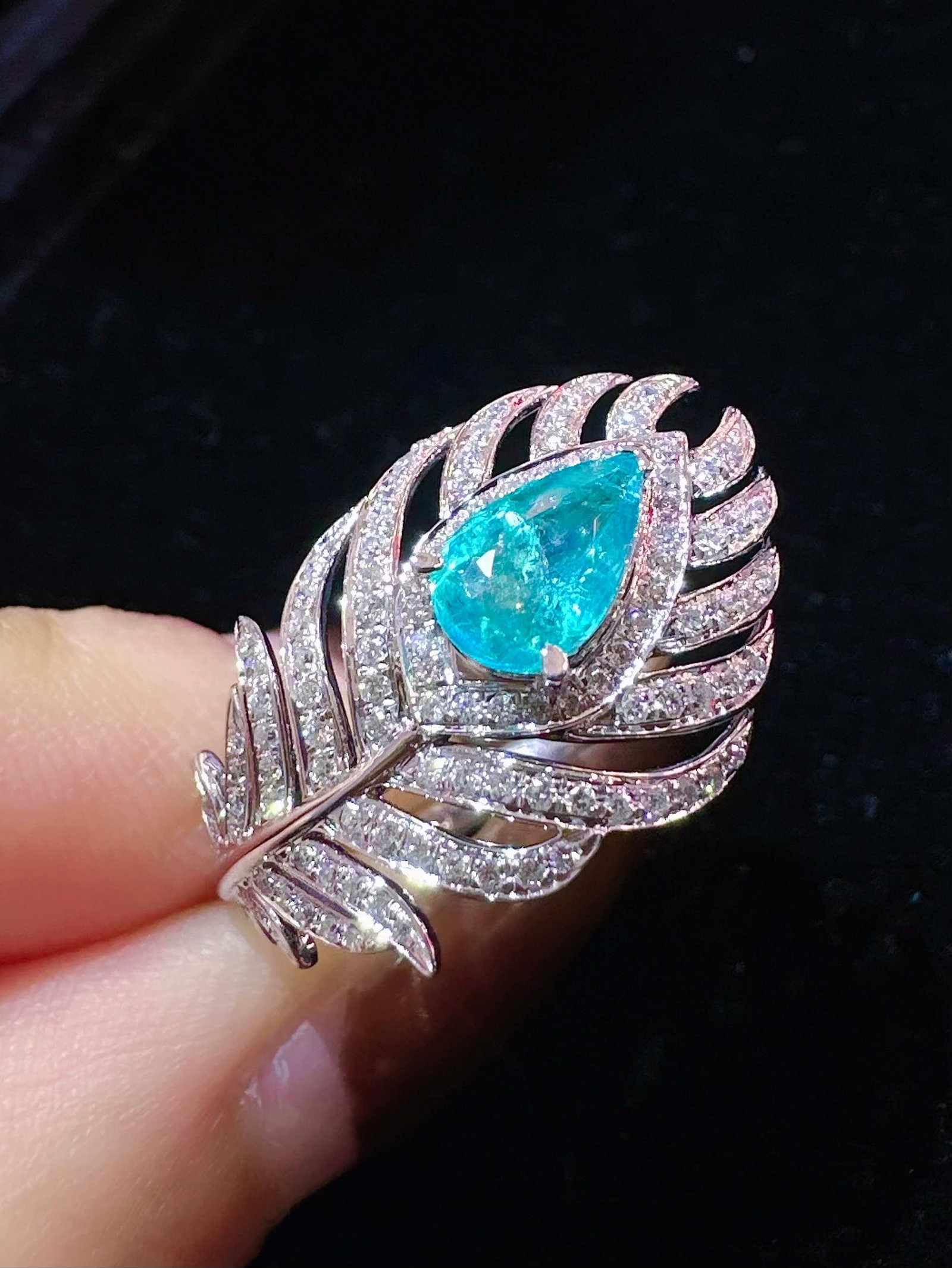 14k Gold 1.35 Ctw Natural Paraiba Tourmaline & Diamond Ring: Ref:231172434 // gold content:14k gold // ring size:7. 25us // // main gemstone:paraiba tourmaline // shape:pear // carat weight:0. 95ct // color:blue // treatment:natural // // adjacent gemstone 2 :