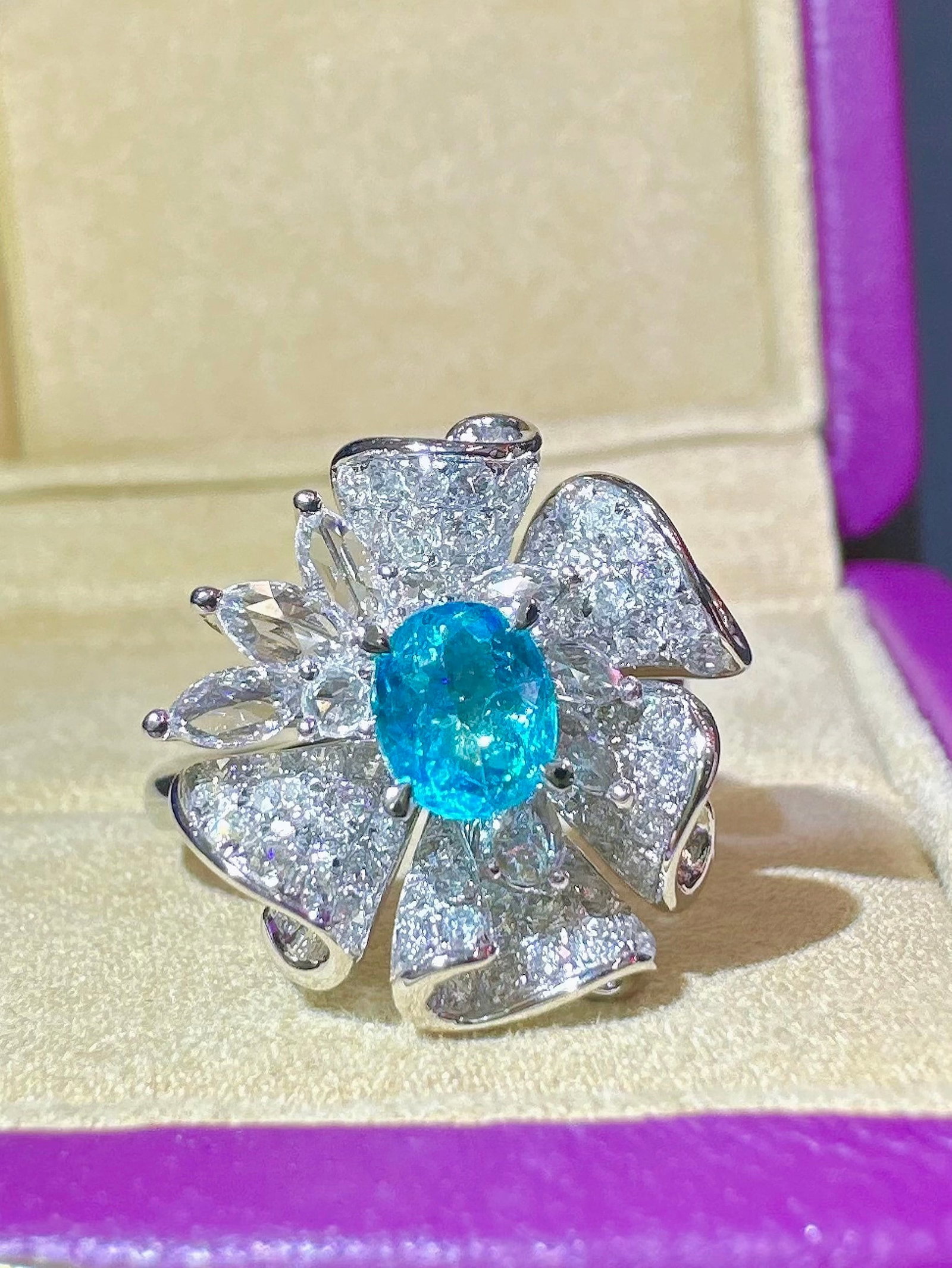 14k Gold 1.70 Ctw Natural Paraiba Tourmaline & Diamond Ring: Ref:231172437 // gold content:14k gold // ring size:7. 25us // // main gemstone:paraiba tourmaline // shape:oval // carat weight:0. 70ct // color:blue // treatment:natural // // adjacent gemstone 2 :