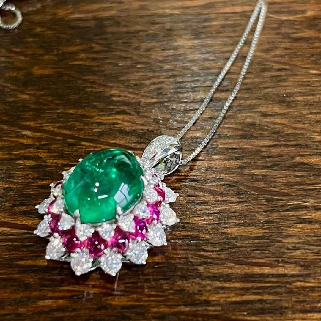 14k Gold 6.89 Ctw Vivid Green Natural Emerald & Spinel Pendant( Without Chain ): Ref:231062382 // gold content:14k gold // main gemstone:emerald // shape:oval // carat weight:5. 26ct // color:vivid green // treatment:natural // // adjacent gemstone 2 : spinel // shape:round // car