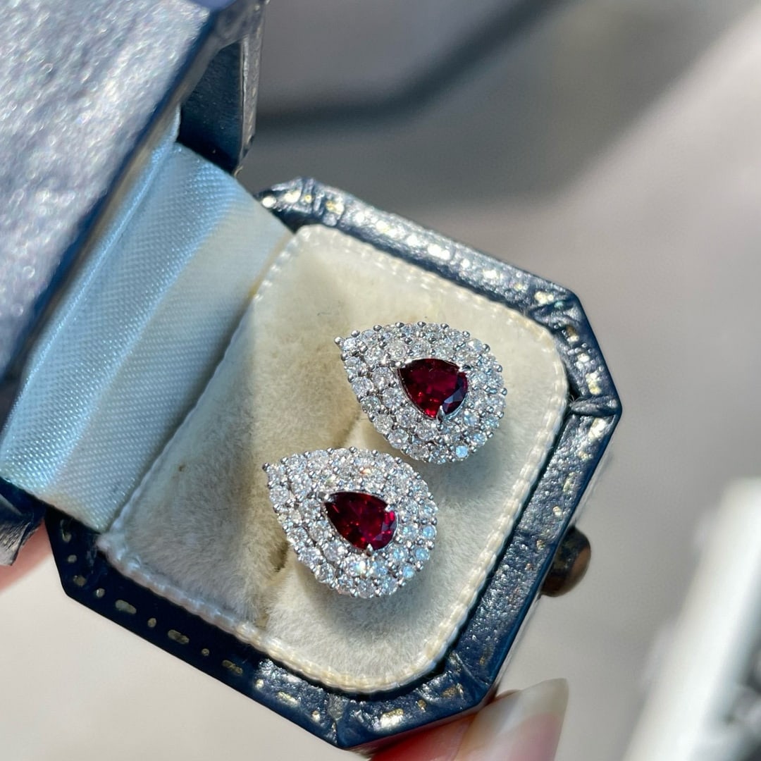 14k Gold 0.6 Ct Natural Ruby & Diamond Earrings: Ref:231064189 // gold content:14k gold // main gemstone:ruby // shape:pear // carat weight:0. 6ct // color:red // treatment:natural // // adjacent gemstone 2 : diamond // shape:round // clarity grade: