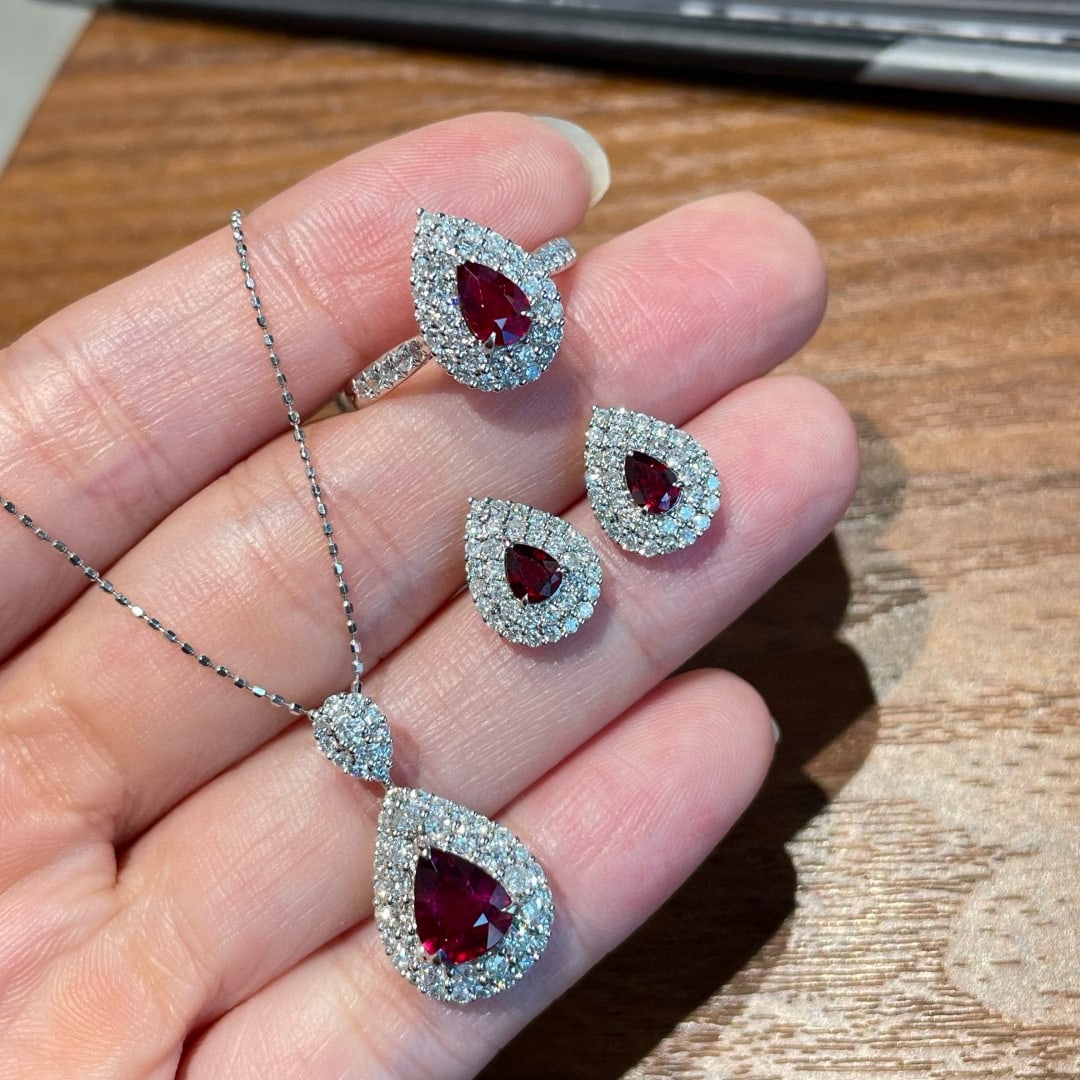 14k Gold 2.23 Ct Natural Ruby & Diamond Jewelry Set: Ref:231064356 // gold content:14k gold // ring size:7. 25us // // pendant(without chain) // main gemstone:ruby // shape:pear // carat weight:1. 03ct // color:pigeonblood red // treatment:natural //