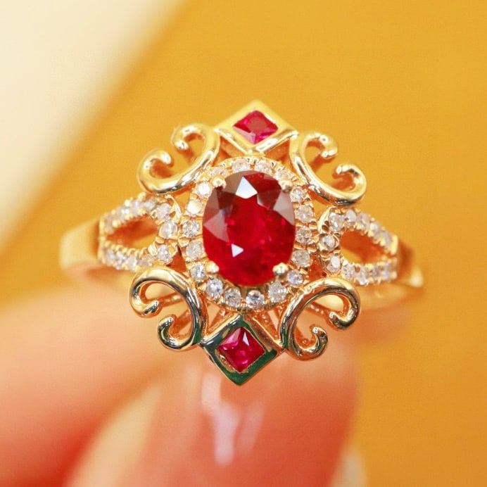 14k Gold 0.65 Ctw Natural Ruby & Diamond Ring: Ref:231067026 // gold content:14k gold // ring size:7. 25 us // // main gemstone:ruby // shape:oval // carat weight:0. 53ct // color:red // treatment:natural // // adjacent gemstone 2 : diamond // num