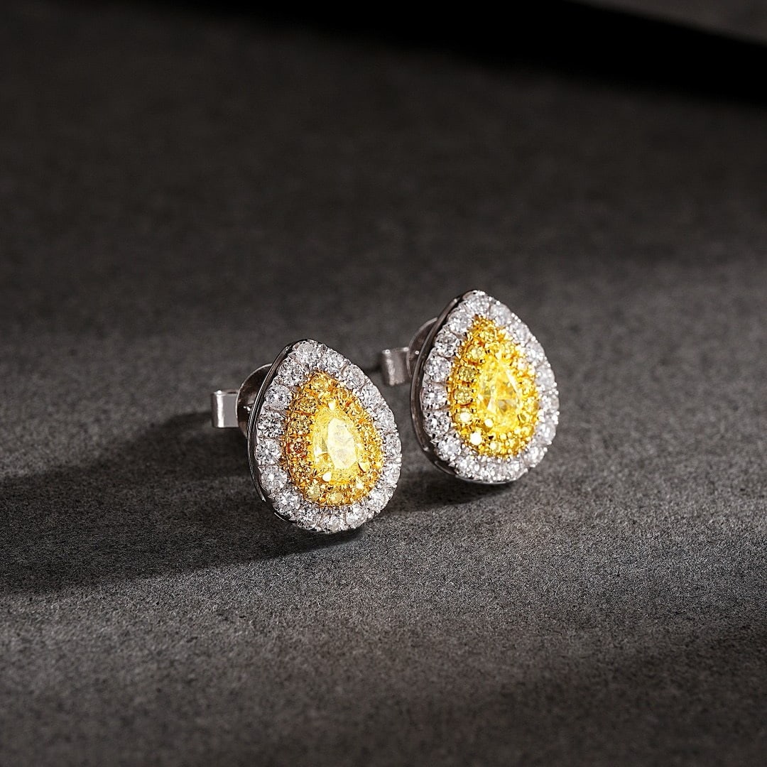 14k Gold 0.66 Ctw Natural Yellow Diamond Earrings: Ref:230794033 // gold content:14k gold // ring size:7. 25us // // main gemstone:yellow diamond // shape:pear // carat weight:0. 27ct // color:yellow // treatment:natural // // adjacent gemstone 2 : di