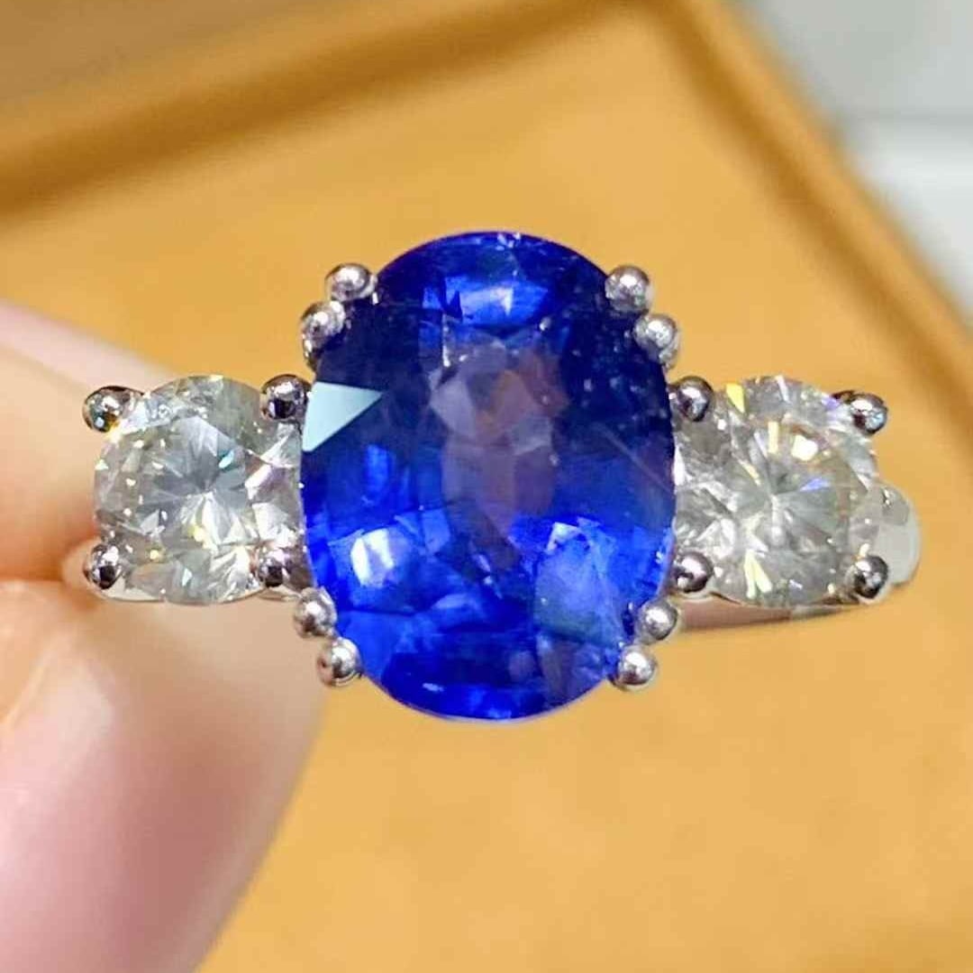 14k Gold 5.05 Ctw Natural Sapphire & Diamond Ring: Ref:231069208 // gold content:14k gold // ring size:7. 25us // // main gemstone:sapphire // shape:oval // carat weight:4. 15ct // color:blue // treatment:natural // // adjacent gemstone 2 :