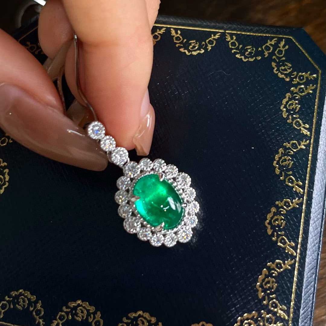 14k Gold 3.63 Ctw Natural Emerald & Diamond Pendant( Without Chain ): Ref:231070347 // gold content:14k gold // main gemstone:emerald // shape:oval // carat weight:3. 16ct // color:green // treatment:natural // // adjacent gemstone 2 : diamond // shape:round // carat