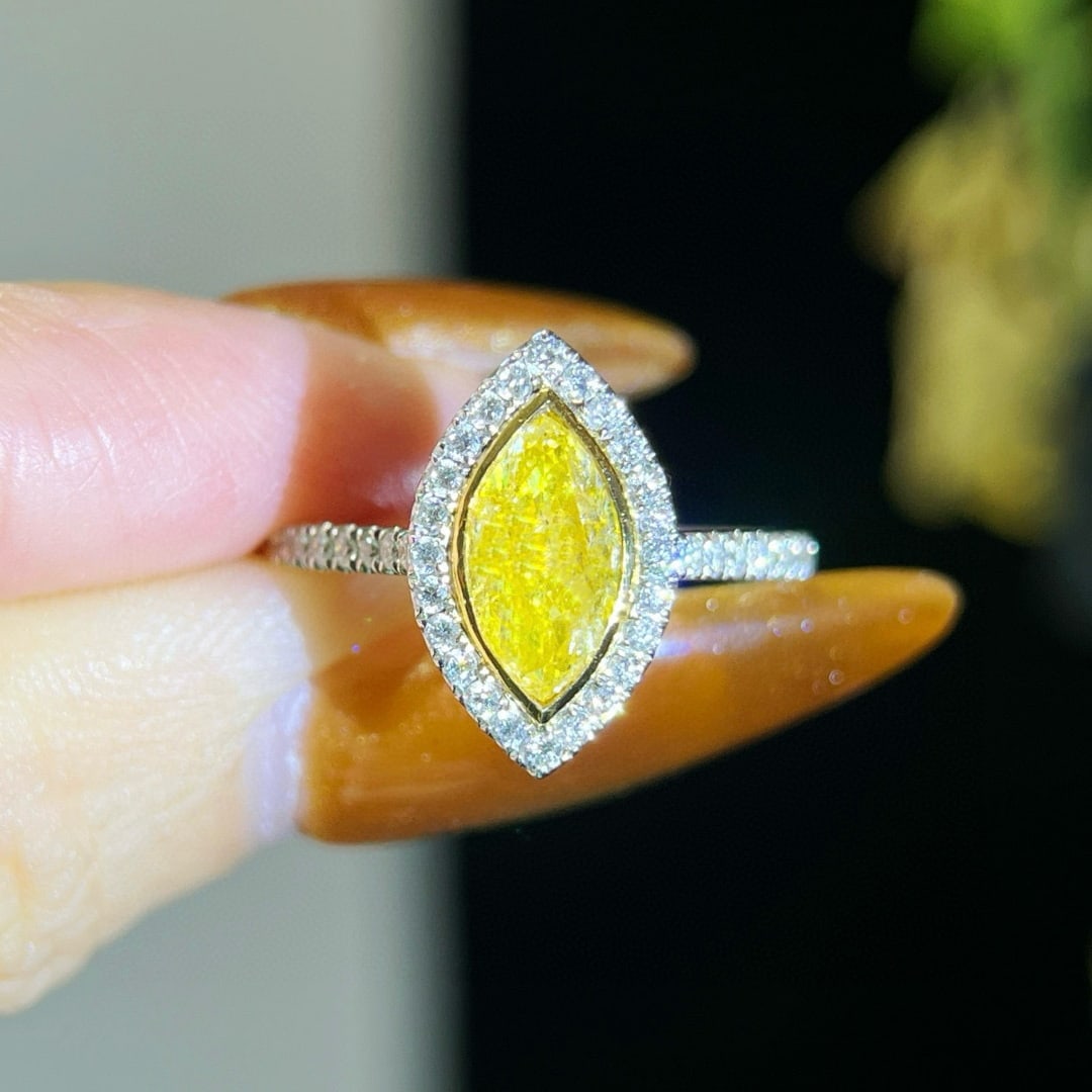 14k Gold 1.34 Ctw Natural Yellow Diamond & Diamond Ring: Ref:231070391 // gold content:14k gold // ring size:7. 25us // // main gemstone:yellow diamond // shape:marquise // carat weight:1. 01ct // color:yellow // treatment:natural // // adjacent gemstone 2