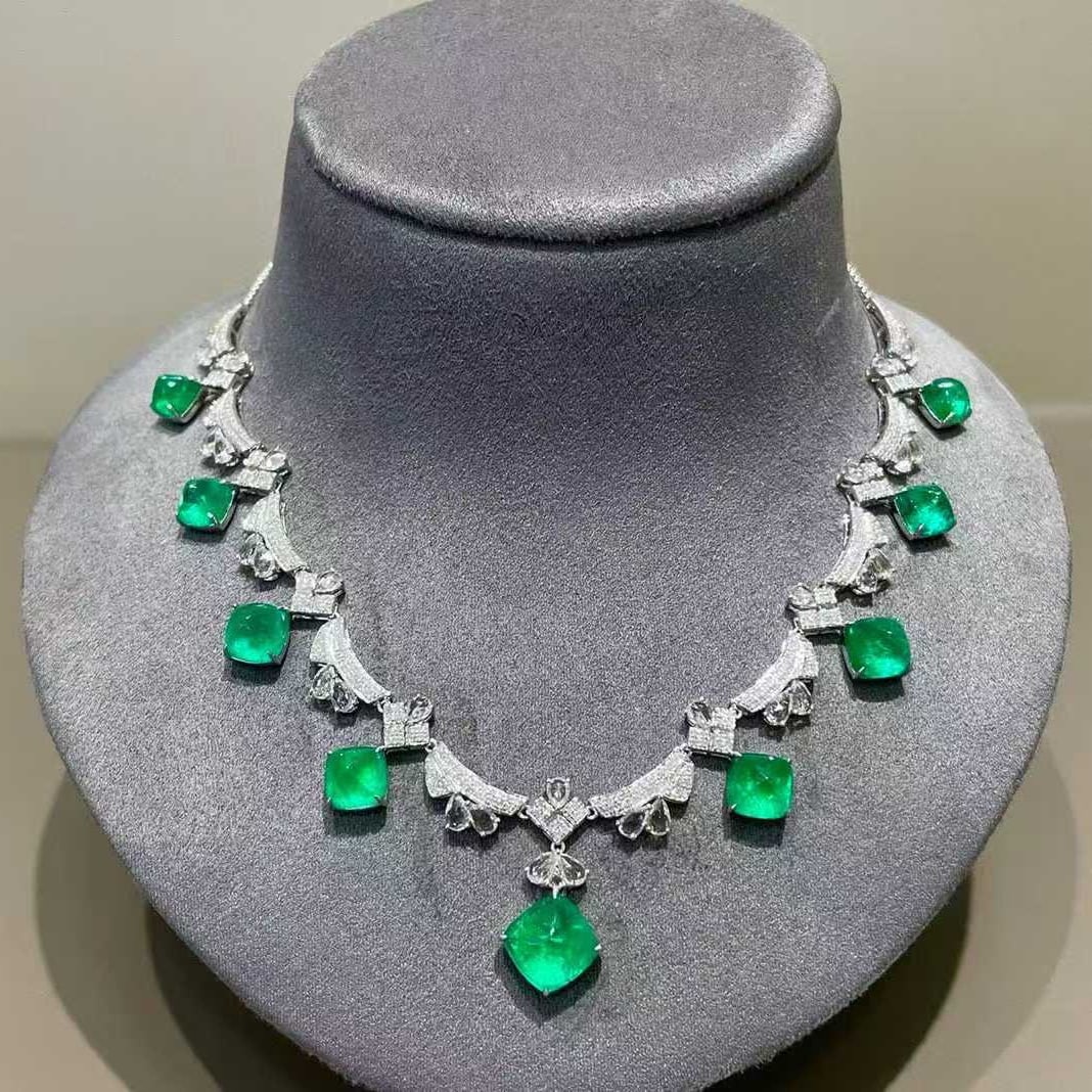 14k Gold 16.2 Ct Vivid Green Natural Emerald & Diamond & Sapphire Necklace: Ref:231071003 // gold content:14k gold // main gemstone:emerald // shape:sugar-loaf // carat weight:16. 2ct // color:vivid green // treatment:natural // // adjacent gemstone 2 : diamond //