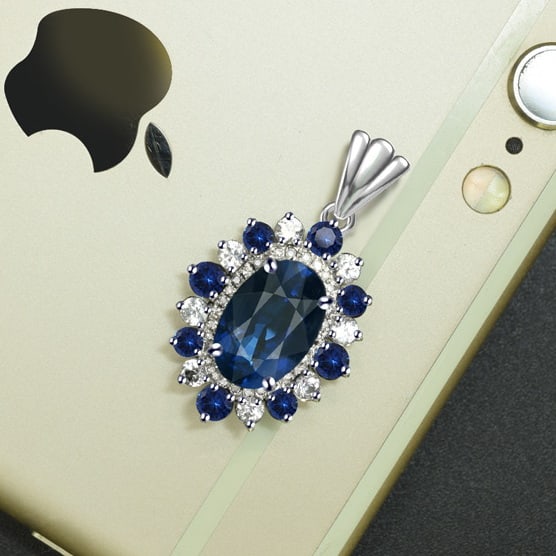 14k Gold 3.99 Ctw Natural Sapphire & Diamond Pendant( Without Chain ): Ref:231071085 // gold content:14k gold // main gemstone:sapphire // shape:oval // carat weight:3. 91ct // color:blue // treatment:natural // // adjacent gemstone 2 : diamond // number of stones:27