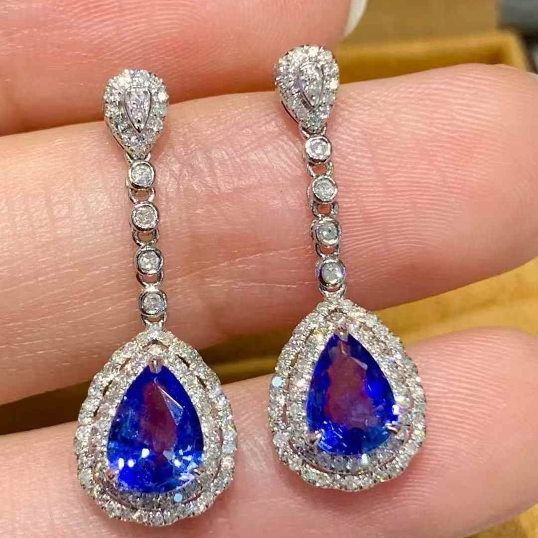 14k Gold 1.6 Ct Natural Sapphire & Diamond Earrings: Ref:231071127 // gold content:14k gold // main gemstone:sapphire // shape:pear // carat weight:1. 6ct // color:blue // treatment:natural // // adjacent gemstone 2 : diamond // shape:round // clarity g