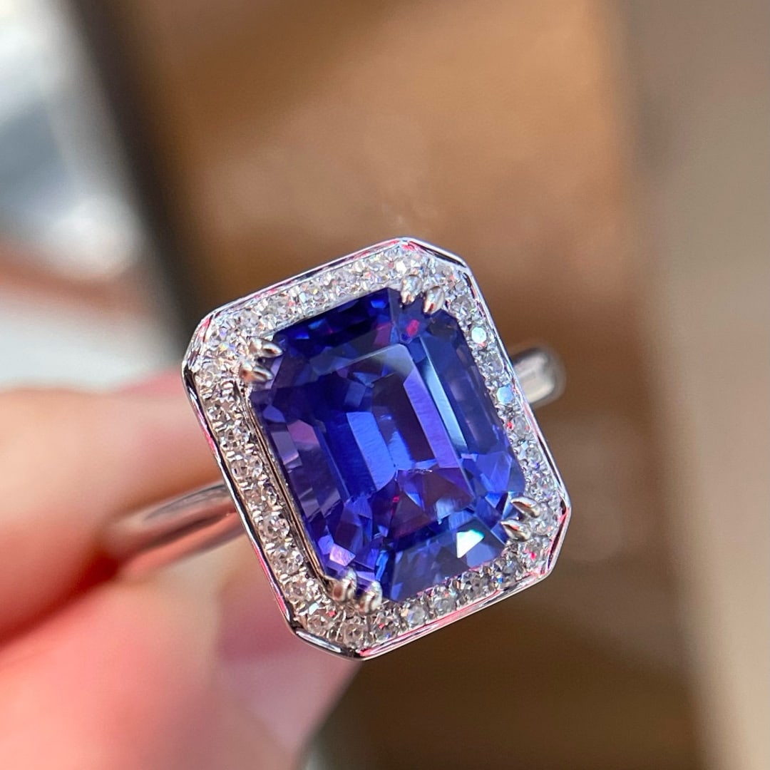 14k Gold 4.56 Ctw Natural Tanzanite & Diamond Ring: Ref:231071185 // gold content:14k gold // ring size:7. 25us // // main gemstone:tanzanite // shape:octagonal // carat weight:4. 40ct // color:blue // treatment:natural // // adjacent gemstone 2 :