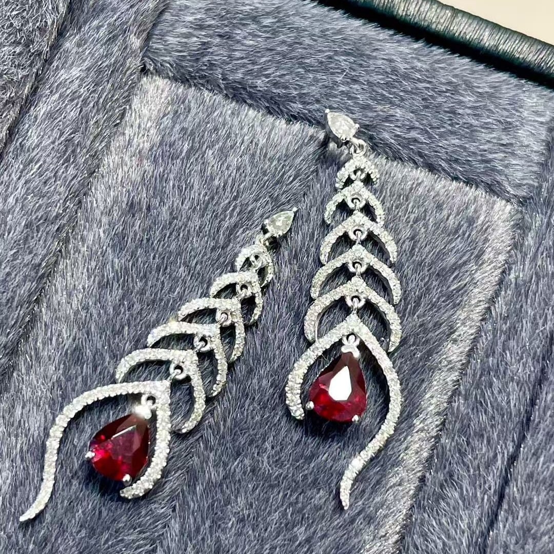 14k Gold 1.15 Ct Natural Ruby & Diamond & Sapphire Earrings: Ref:231071196 // gold content:14k gold // main gemstone:ruby // shape:pear // carat weight:1. 15ct // color:pigeonblood red // treatment:natural // // adjacent gemstone 2 : diamond // shape:round