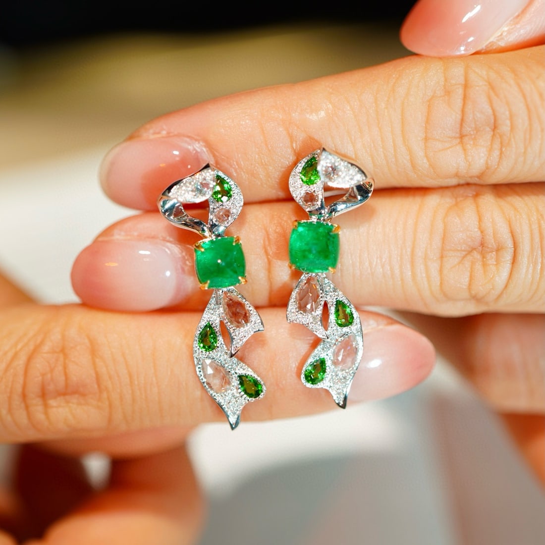 14k Gold 1.7 Ct Vivid Green Natural Emerald & Diamond & Sapphire & Tsavorite Earrings: Ref:231072088 // gold content:14k gold // main gemstone:emerald // shape:sugar-loaf // carat weight:1. 7ct // color:vivid green // treatment:natural // // adjacent gemstone 2 : diamond // shape:round