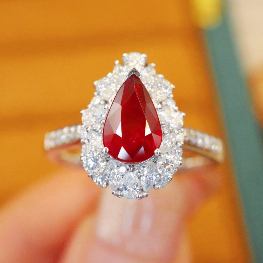 14k Gold 1.76 Ctw Natural Ruby & Diamond Ring/pendant( Without Chain ): Ref:231072101 // gold content:14k gold // ring size:7. 25us // // main gemstone:ruby // shape:pear // carat weight:1. 03ct // color:pigeonblood red // treatment:natural // // adjacent gemstone 2 :
