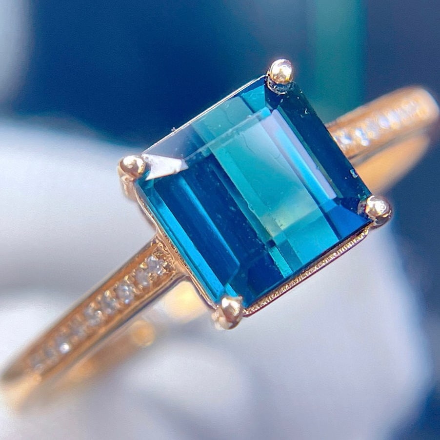 14k Gold 2.45 Ct Natural Tourmaline & Diamond Ring: Ref:231072102 // gold content:14k gold // ring size:7. 25us // // main gemstone:tourmaline // shape:octagonal // carat weight:2. 45ct // color:blue // treatment:natural // // adjacent gemstone 2 :