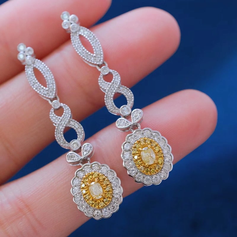 14k Gold 1.38 Ct Natural Color Diamond Earrings: Ref:231072129 // gold content:14k gold // main gemstone:diamond // shape:multiple // carat weight:1. 38ct // clarity grade:vs-si // color:color // treatment:natural // Condition: NewLow Estimate: