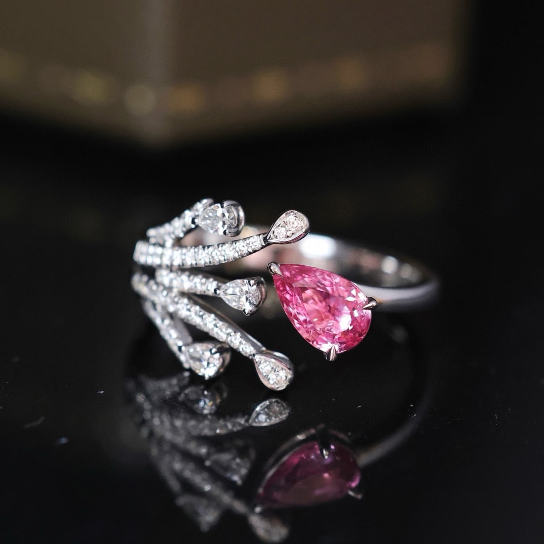 14k Gold 1.16 Ctw Natural Padparadscha Sapphire & Diamond Ring: Ref:231072240 // gold content:14k gold // ring size:7. 25us // // main gemstone:padparadscha sapphire // shape:pear // carat weight:0. 84ct // color:orangish pink // treatment:natural // //