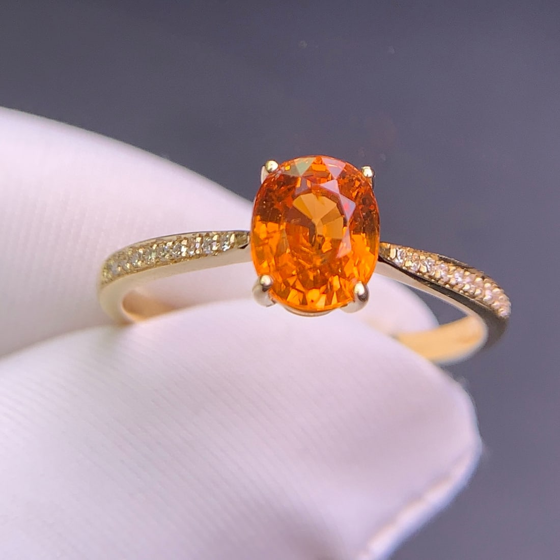14k Gold 1.6 Ct Natural Spessartine & Diamond Ring: Ref:231072272 // gold content:14k gold // ring size:7. 25us // // main gemstone:spessartine // shape:oval // carat weight:1. 6ct // color:orange // treatment:natural // // adjacent gemstone 2 :