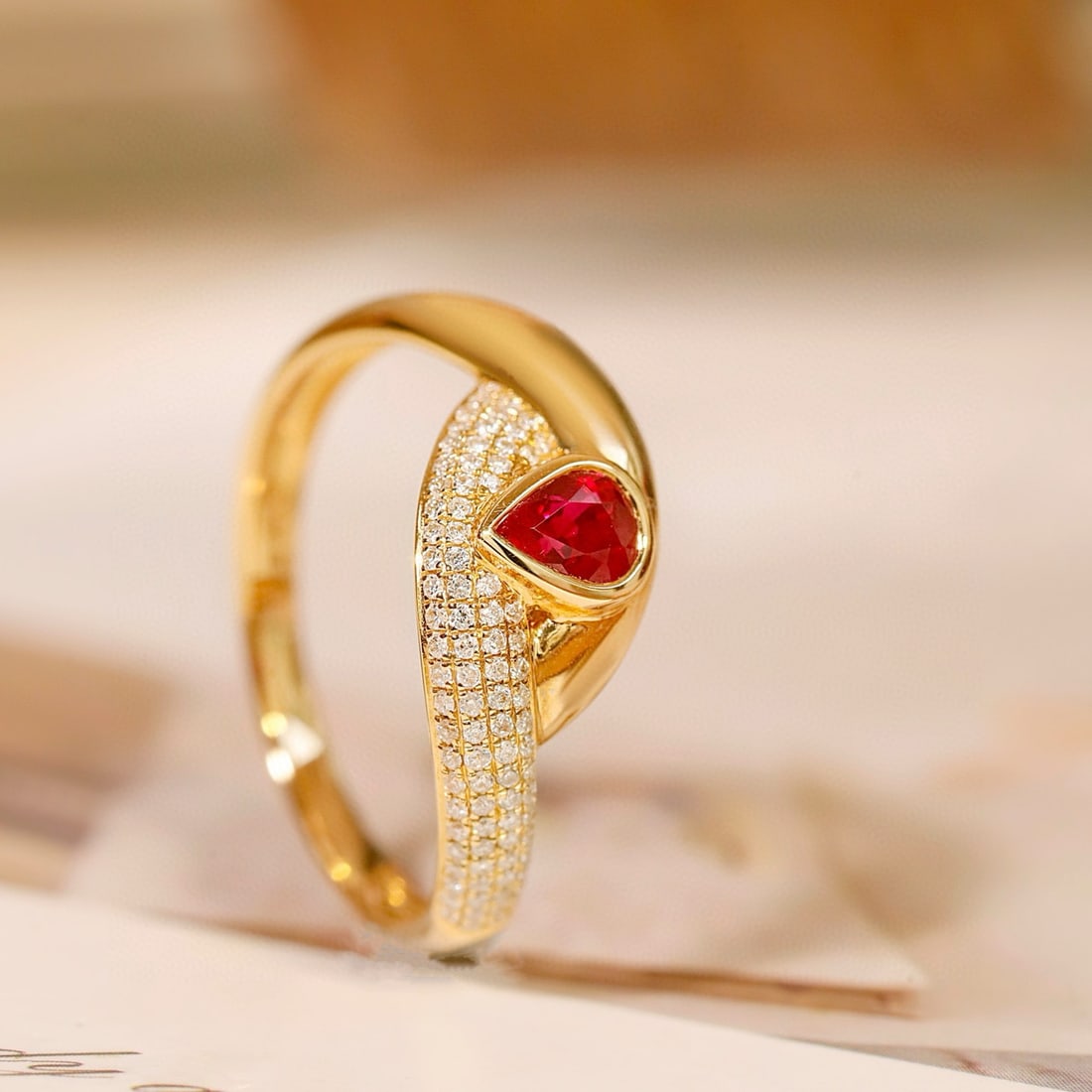 14k Gold 0.69 Ctw Natural Ruby & Diamond Ring: Ref:231072273 // gold content:14k gold // ring size:7. 25us // // main gemstone:ruby // shape:pear // carat weight:0. 53ct // color:pigeonblood red // treatment:natural // // adjacent gemstone 2 :