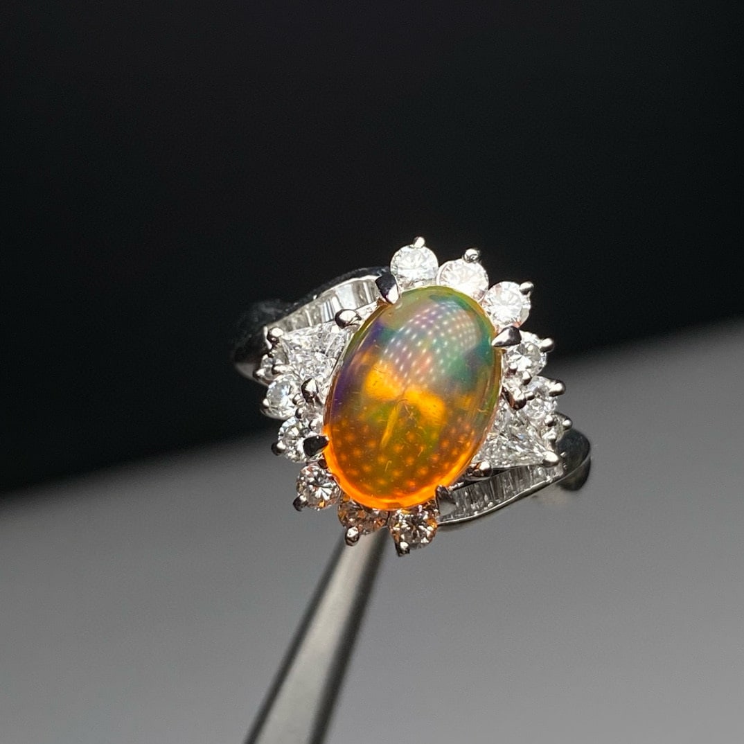 14k Gold 3.08 Ctw Natural Opal & Diamond Ring: Ref:231072280 // gold content:14k gold // ring size:7. 25us // // main gemstone:opal // shape:oval // carat weight:2. 31ct // color:color // treatment:natural // // adjacent gemstone 2 : diamond