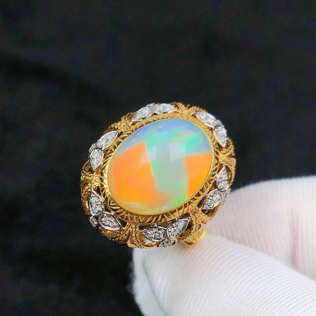 14k Gold 5.43 Ctw Natural Opal & Diamond Ring: Ref:231072292 // gold content:14k gold // ring size:7. 25us // // main gemstone:opal // shape:oval // carat weight:5. 25ct // color:color // treatment:natural // // adjacent gemstone 2 : diamond