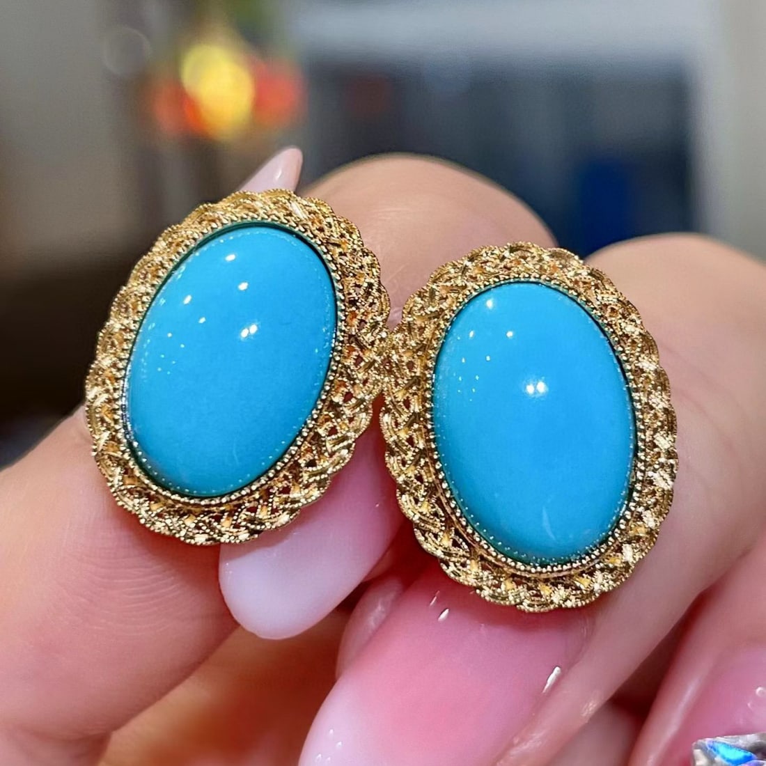 14k Gold 8.86 Ct Natural Blue Turquoise Earrings: Ref:231073162 // gold content:14k gold // main gemstone:blue turquoise // shape:oval // carat weight:8. 86ct // color:blue // treatment:natural // Condition: New Low Estimate: 7000.00 High Estimate: