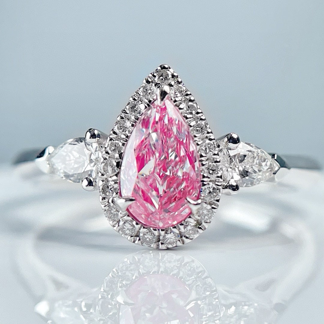 14k Gold 0.82 Ctw Natural Pink Diamond & Diamond Ring: Ref:231074025 // gold content:14k gold // ring size:7. 25us // // main gemstone:pink diamond // shape:pear // carat weight:0. 55ct // color:pink // treatment:natural // // adjacent gemstone 2 :