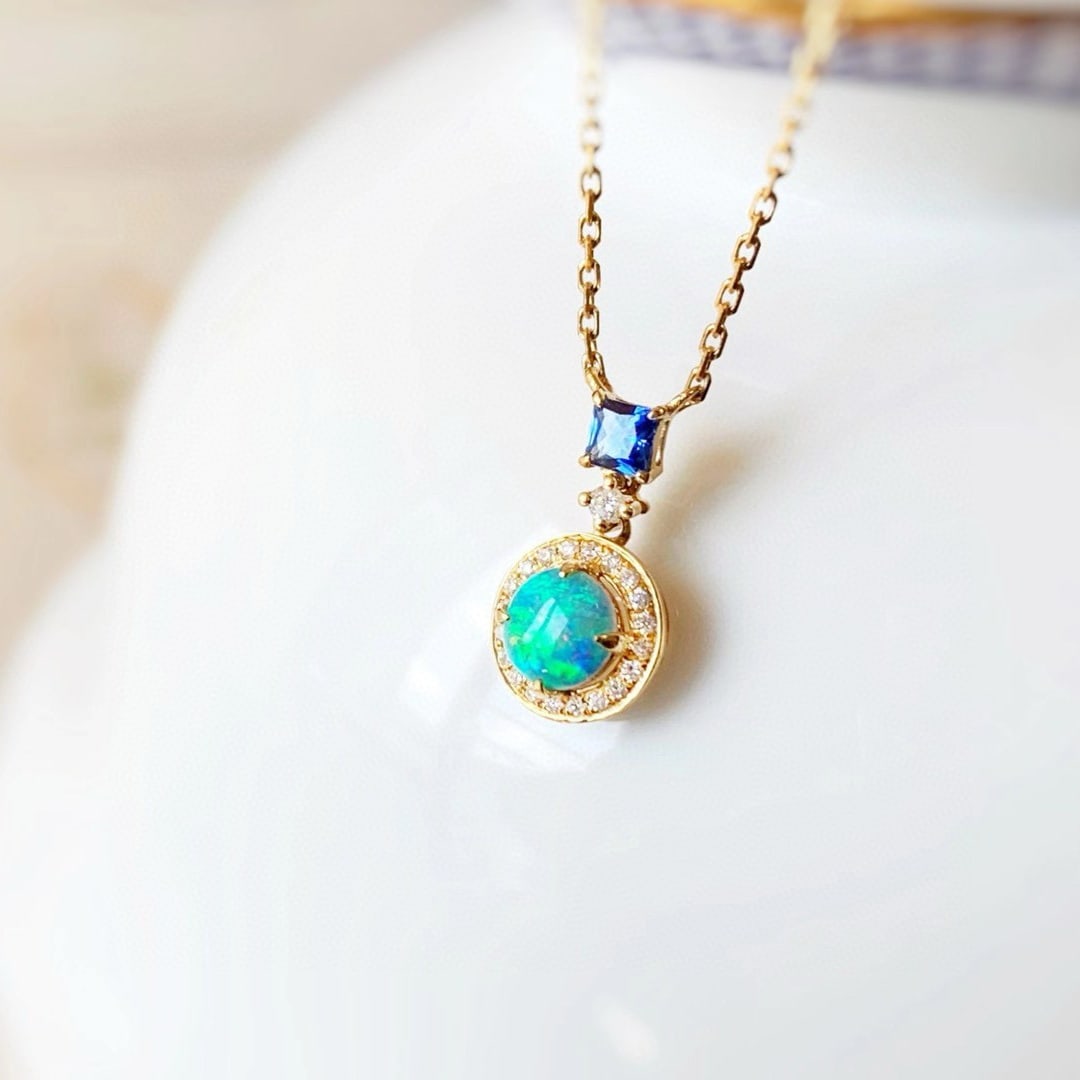 14k Gold 0.32 Ctw Natural Opal & Sapphire Necklace: Ref:231074037 // gold content:14k gold // main gemstone:opal // shape:round // carat weight:0. 2ct // color:color // treatment:natural // cut grade:g // // adjacent gemstone 2 : sapphire //