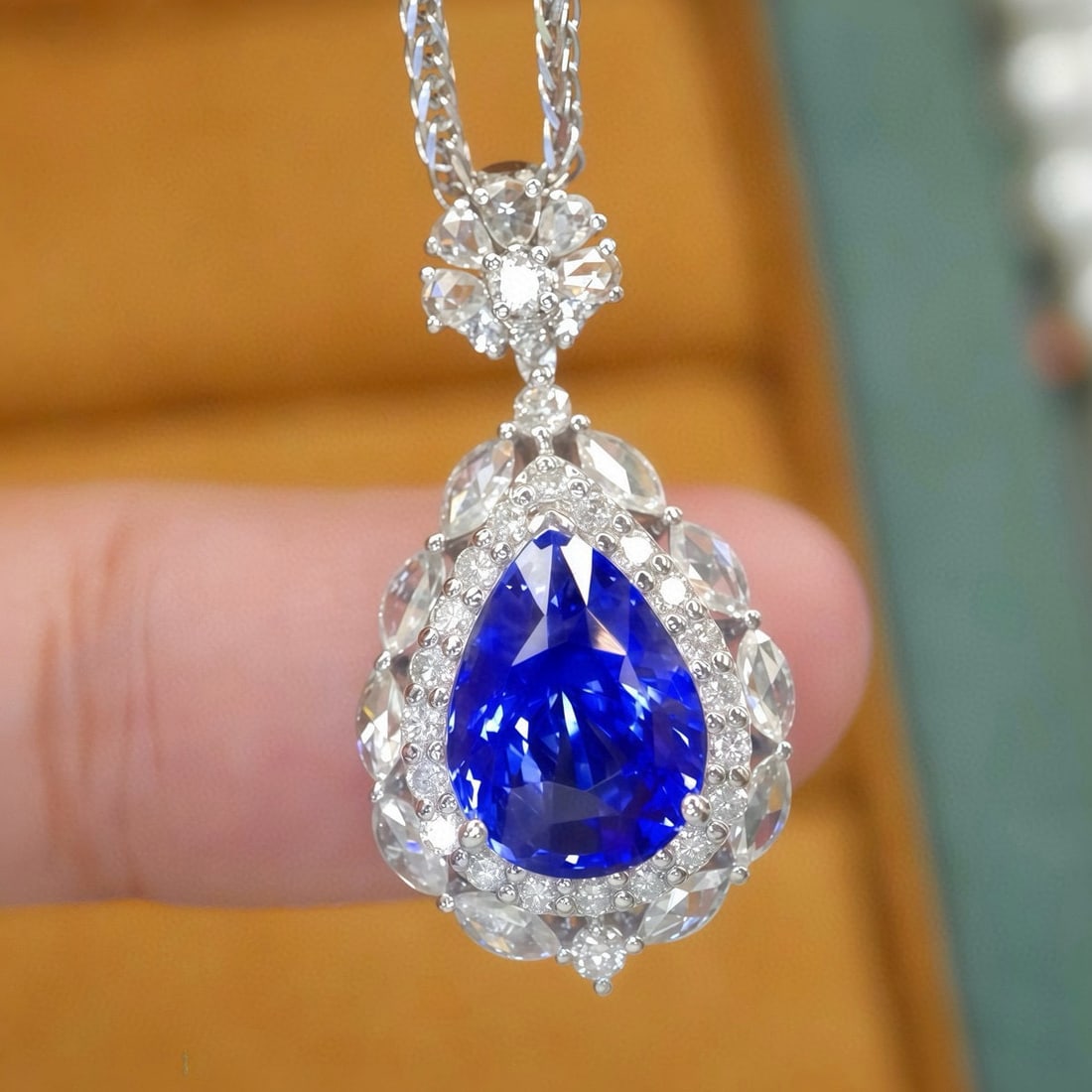 14k Gold 2.77 Ctw Natural Sapphire & Diamond Pendant( Without Chain ): Ref:231074190 // gold content:14k gold // main gemstone:sapphire // shape:pear // carat weight:2. 28ct // color:royal blue // treatment:natural // // adjacent gemstone 2 : diamond // number of