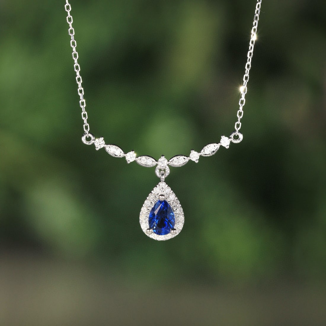 14k Gold 0.67 Ct Natural Sapphire & Diamond Necklace: Ref:231074214 // gold content:14k gold // main gemstone:sapphire // shape:pear // carat weight:0. 67ct // color:royal blue // treatment:natural // // adjacent gemstone 2 : diamond // shape:round //