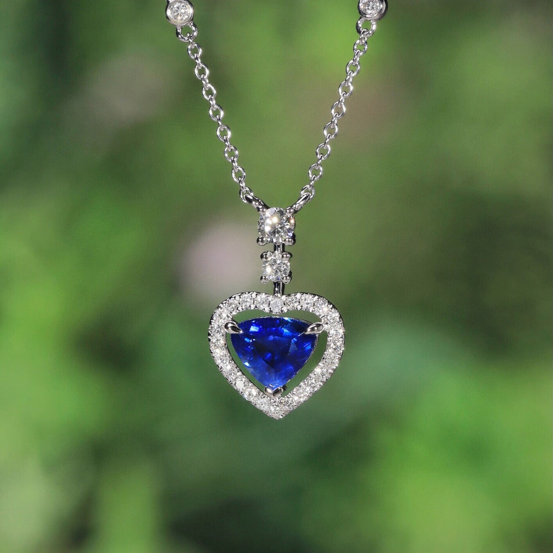 14k Gold 1.01 Ct Natural Sapphire & Diamond Necklace: Ref:231074254 // gold content:14k gold // main gemstone:sapphire // shape:triangle // carat weight:1. 01ct // color:blue // treatment:natural // // adjacent gemstone 2 : diamond // shape:round //