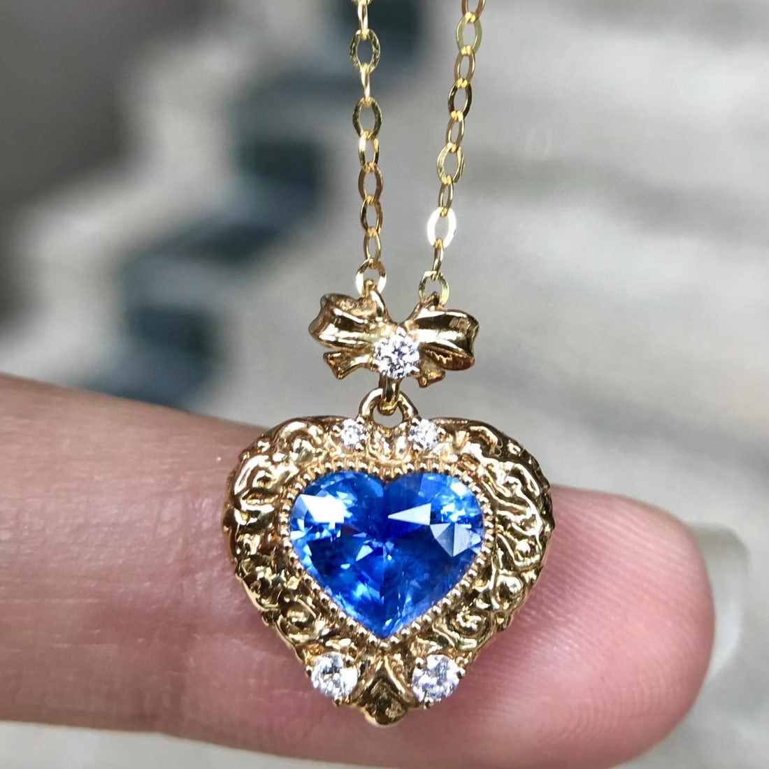 14k Gold 1.75 Ctw Natural Sapphire & Diamond Necklace: Ref:231074386 // gold content:14k gold // main gemstone:sapphire // shape:heart // carat weight:1. 58ct // color:blue // treatment:natural // // adjacent gemstone 2 : diamond // shape:round //