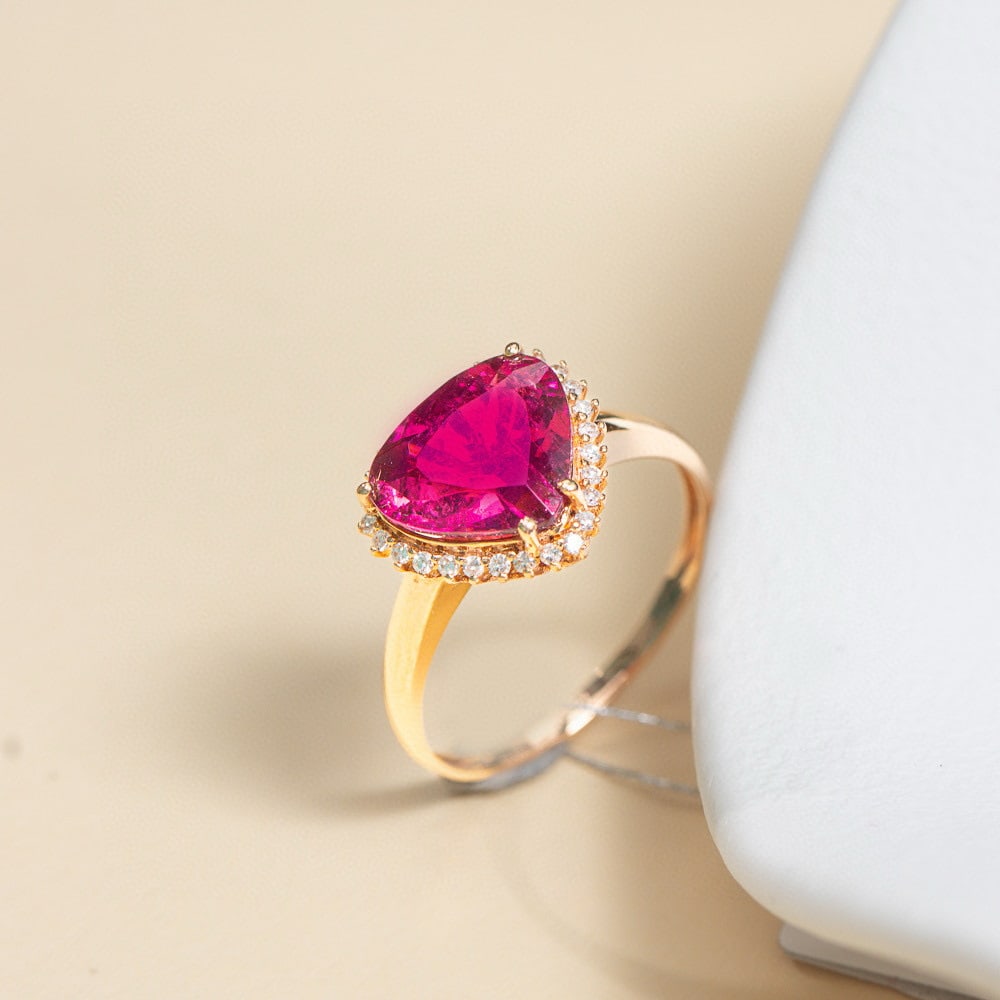 14k Gold 2.83 Ctw Natural Tourmaline & Diamond Ring: Ref:231074429 // gold content:14k gold // ring size:7. 25us // // main gemstone:tourmaline // shape:pear // carat weight:2. 55ct // color:red // treatment:natural // // adjacent gemstone 2 :