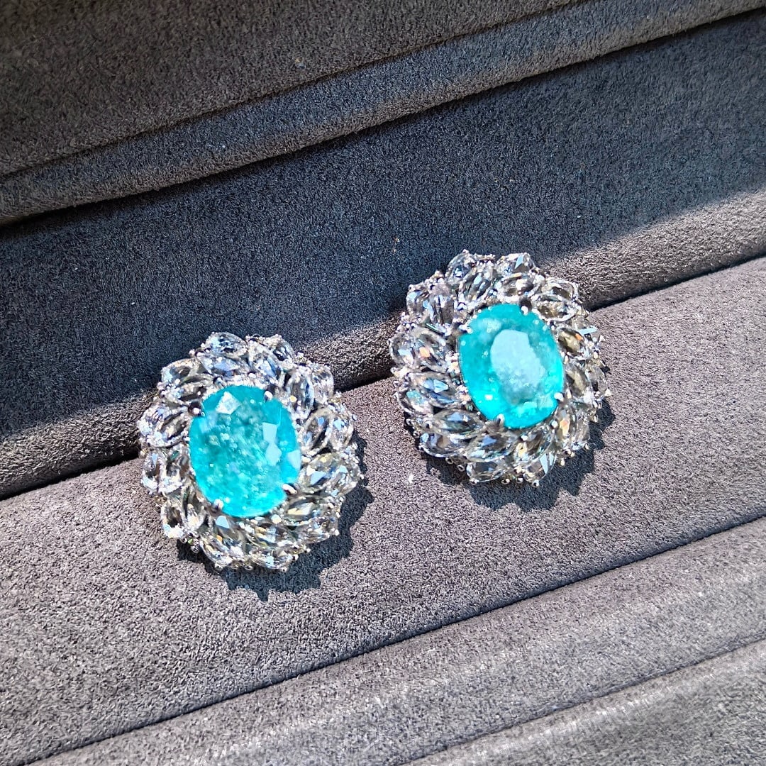 14k Gold 7.13 Ctw Natural Paraiba Tourmaline & Sapphire Earrings: Ref:231075199 // gold content:14k gold // main gemstone:paraiba tourmaline // shape:oval // carat weight:3. 83ct // color:blue // treatment:natural // // adjacent gemstone 2 : sapphire //