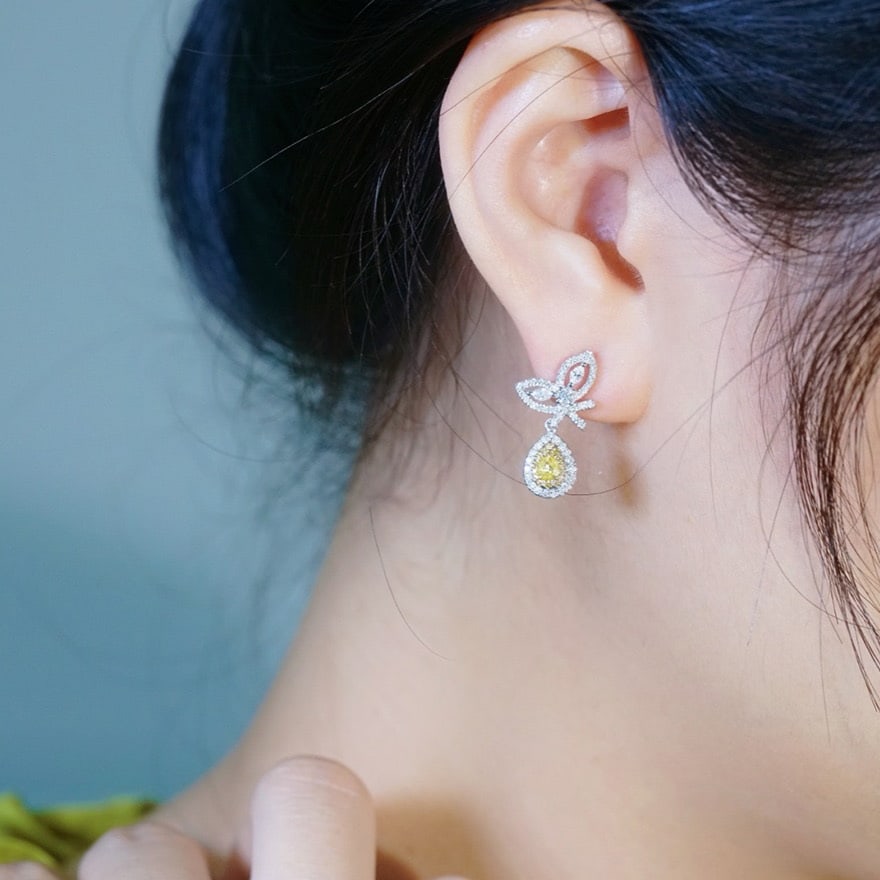 14k Gold 0.9 Ct Natural Color Diamond Earrings: Ref:231075229 // gold content:14k gold // main gemstone:diamond // shape:multiple // carat weight:0. 9ct // clarity grade:vs-si // color:color // treatment:natural // Condition: NewLow Estimate: