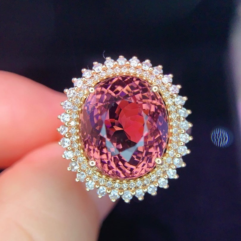 14k Gold 7.5 Ct Natural Tourmaline & Diamond Ring: Ref:231075251 // gold content:14k gold // ring size:7. 25us // // main gemstone:tourmaline // shape:oval // carat weight:7. 5ct // color:red // treatment:natural // // adjacent gemstone 2 : diamond //