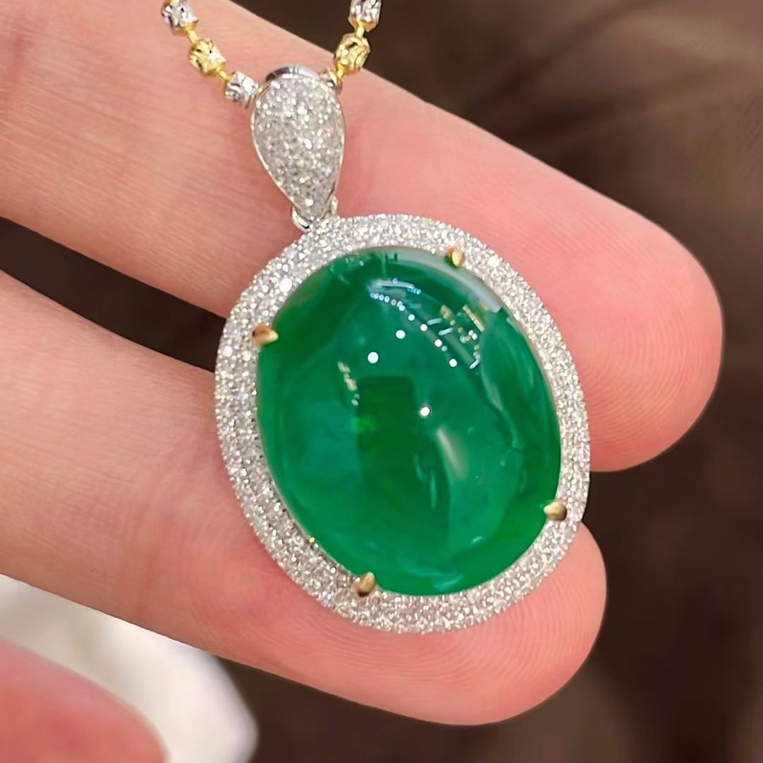 14k Gold 16 Ct Natural Emerald & Diamond Pendant( Without Chain ): Ref:231075257 // gold content:14k gold // main gemstone:emerald // shape:oval // carat weight:16ct // color:green // treatment:natural // // adjacent gemstone 2 : diamond // shape:round // clarity