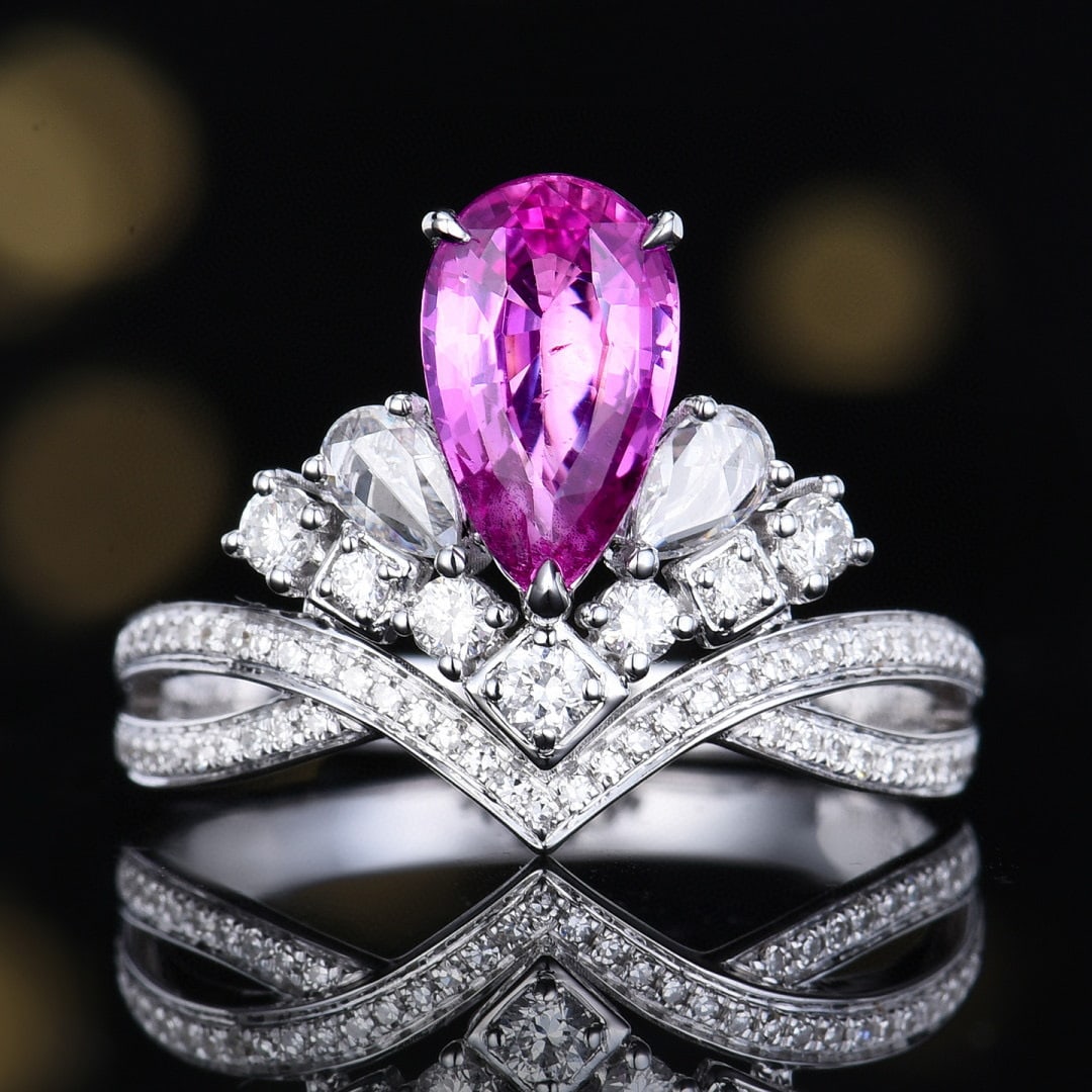 14k Gold 1.97 Ctw Natural Sapphire & Diamond Ring: Ref:231076009 // gold content:14k gold // ring size:7. 25us // // main gemstone:sapphire // shape:pear // carat weight:1. 52ct // color:pink // treatment:natural // // adjacent gemstone 2 :