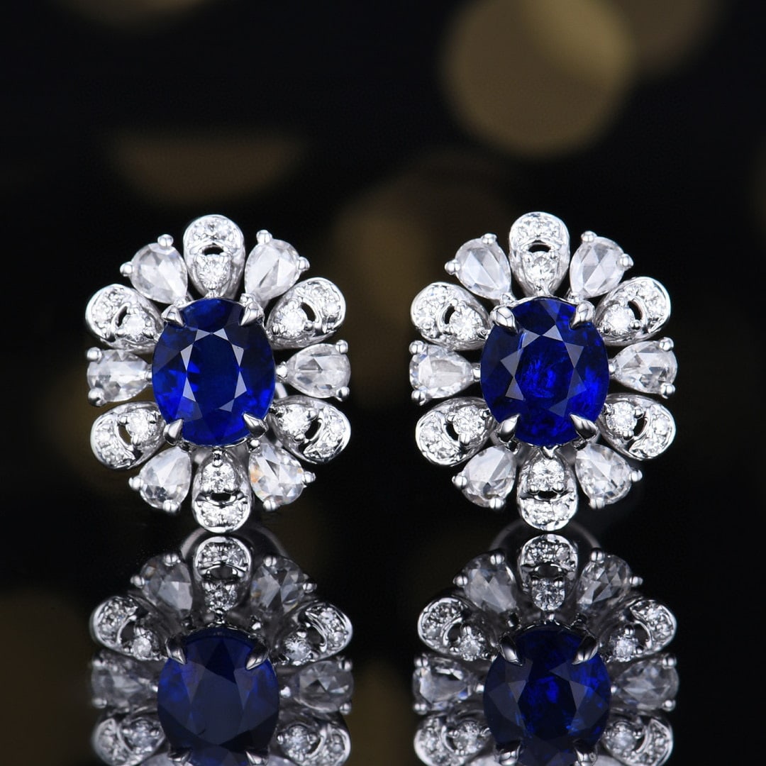 14k Gold 1.87 Ctw Natural Sapphire & Diamond Earrings: Ref:231076031 // gold content:14k gold // main gemstone:sapphire // shape:oval // carat weight:1. 39ct // color:royal blue // treatment:natural // // adjacent gemstone 2 : diamond // number of stones: