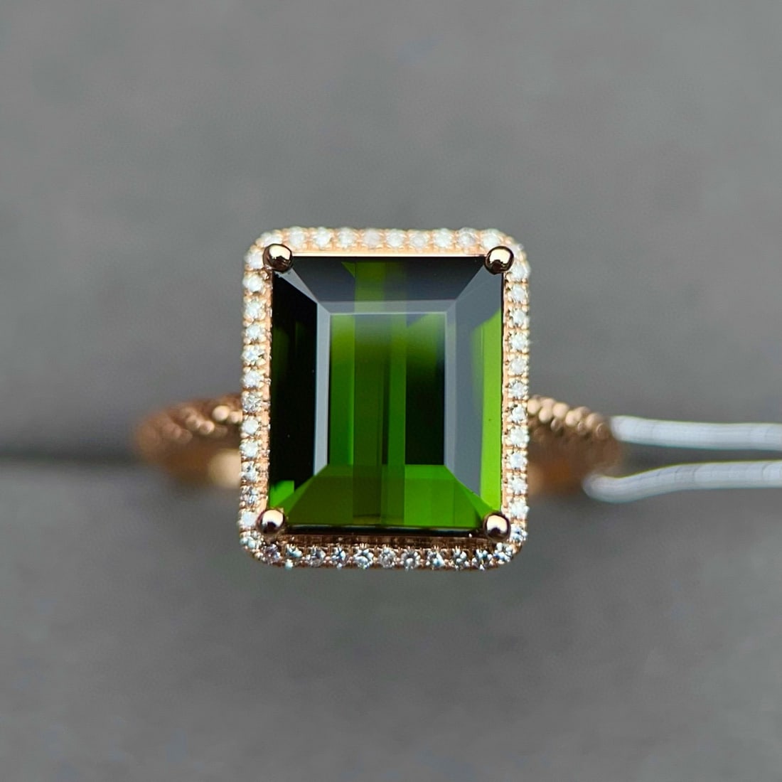 14k Gold 4.09 Ctw Natural Tourmaline & Diamond Ring: Ref:231076129 // gold content:14k gold // ring size:7. 25us // // main gemstone:tourmaline // shape:octagonal // carat weight:3. 95ct // color:green // treatment:natural // // adjacent gemstone 2