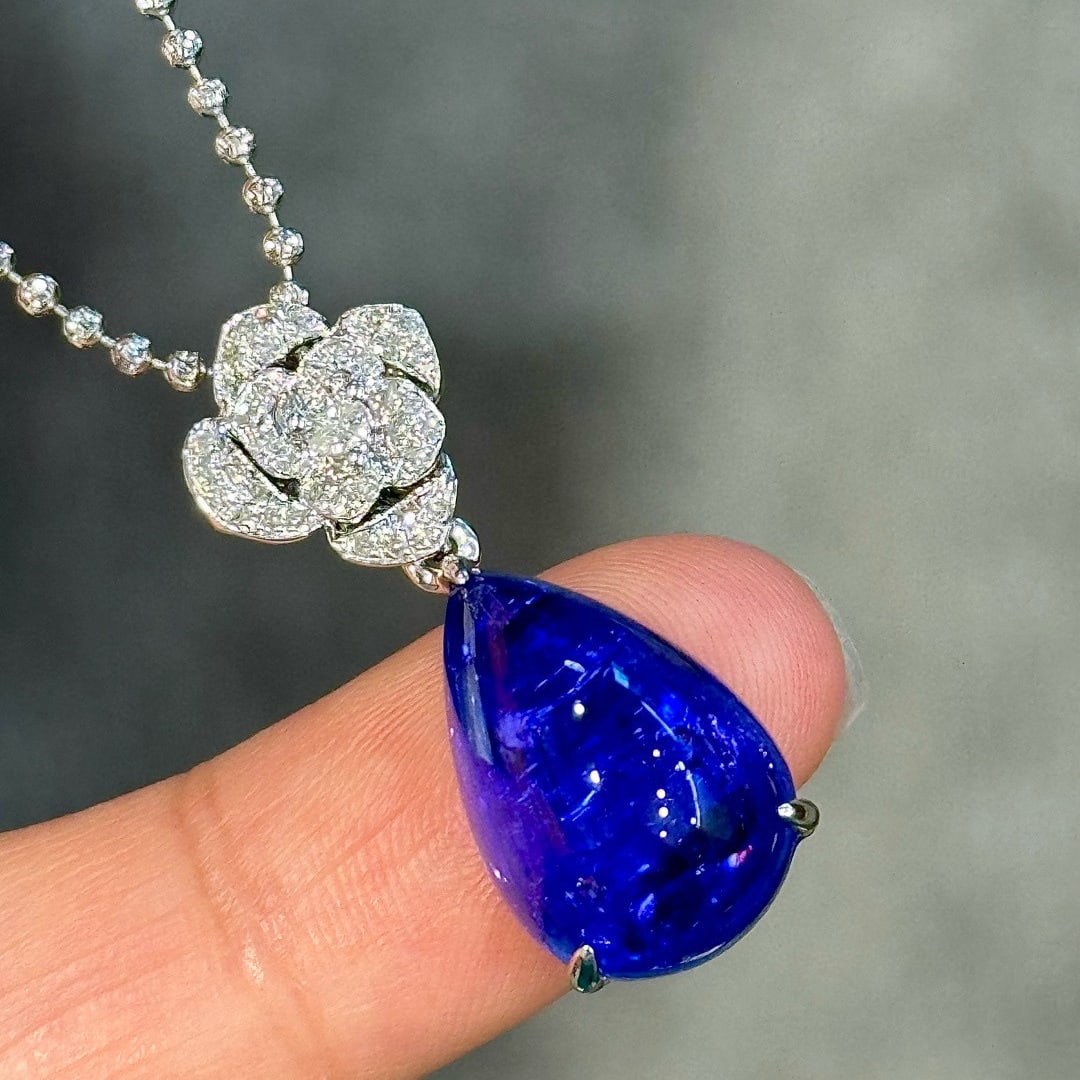 14k Gold 11.61 Ctw Natural Tanzanite & Diamond Pendant( Without Chain ): Ref:230947055 // gold content:14k gold // main gemstone:sapphire // shape:oval // carat weight:1. 16ct // color:blue // treatment:natural // // adjacent gemstone 2 : sapphire // shape:pear // carat