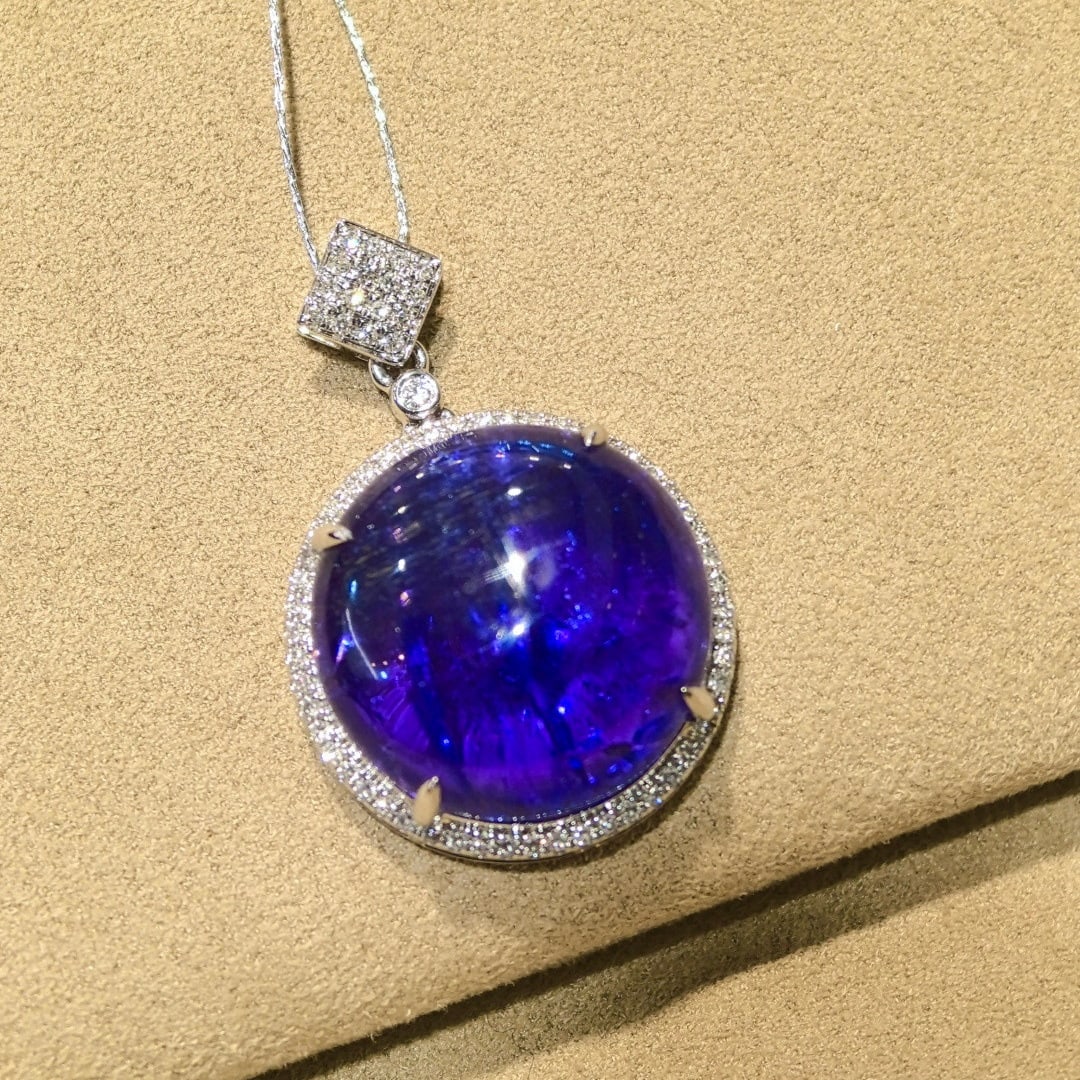 14k Gold 16.61 Ctw Natural Tanzanite & Diamond Pendant( Without Chain ): Ref:230947088 // gold content:14k gold // main gemstone:topaz // shape:octagonal // carat weight:15. 45ct // color:swiss blue // treatment:natural // // adjacent gemstone 2 : diamond // shape:round
