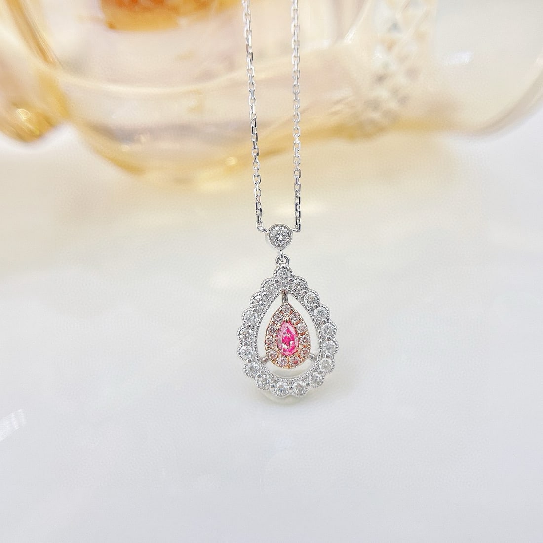 14k Gold 0.38 Ctw Natural Pink Diamond & Diamond Necklace: Ref:231078045 // gold content:14k gold // main gemstone:pink diamond // shape:pear // carat weight:0. 08ct // color:pink // treatment:natural // // adjacent gemstone 2 : diamond // shape:round //