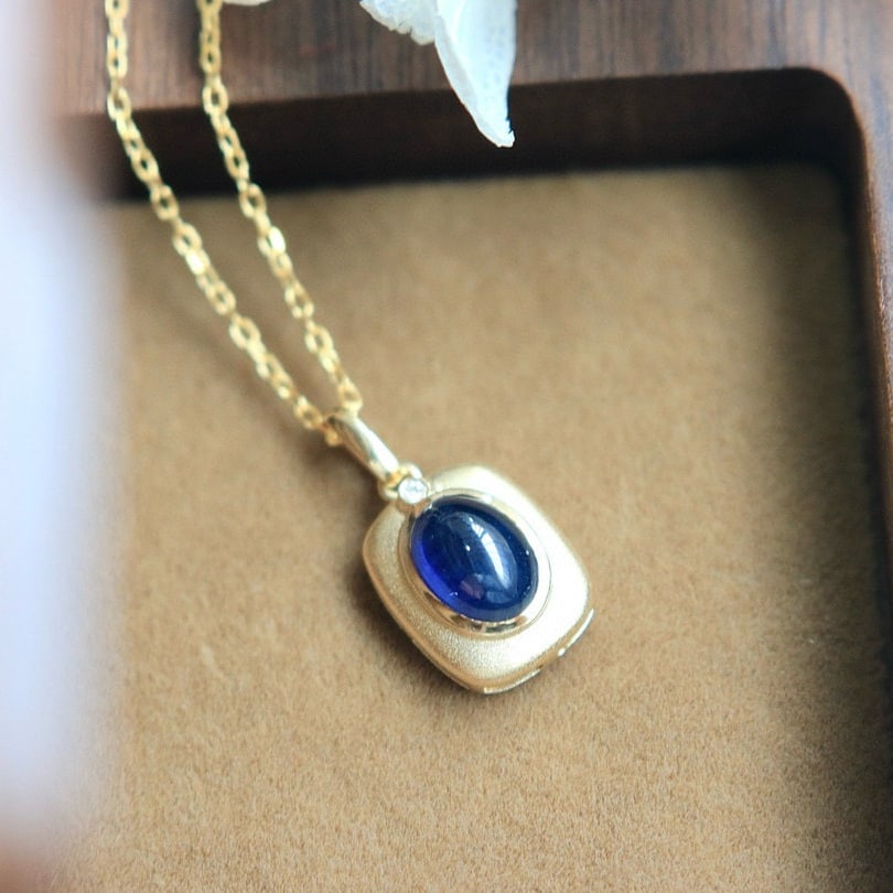 14k Gold 1.5 Ct Natural Sapphire & Diamond Pendant( Without Chain ): Ref:231078131 // gold content:14k gold // main gemstone:sapphire // shape:oval // carat weight:1. 5ct // color:blue // treatment:natural // // adjacent gemstone 2 : diamond // shape:round //