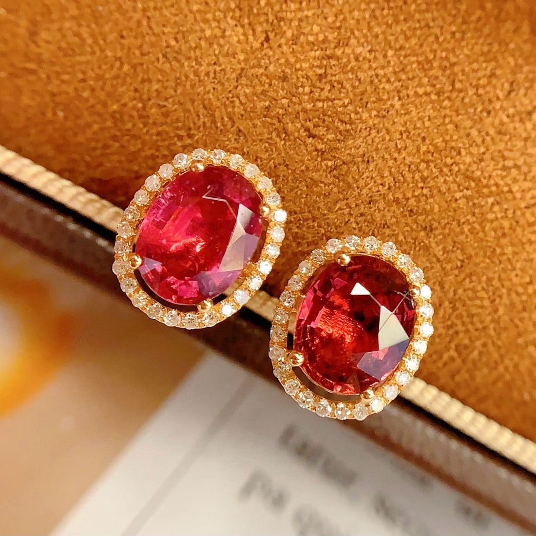14k Gold 3.5 Ct Natural Tourmaline & Diamond Earrings: Ref:231078149 // gold content:14k gold // main gemstone:tourmaline // shape:oval // carat weight:3. 5ct // color:red // treatment:natural // // adjacent gemstone 2 : diamond // number of stones:53 //