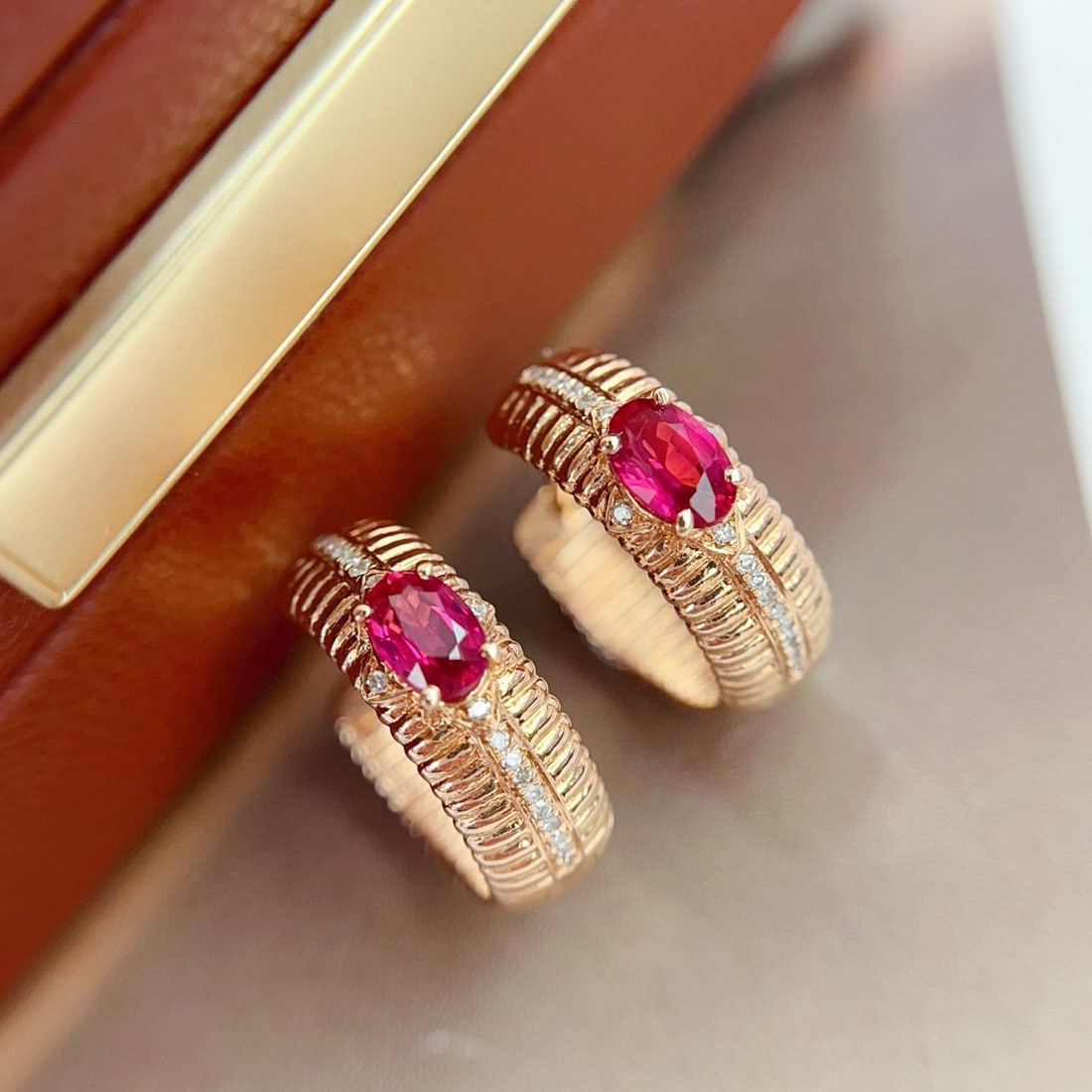 14k Gold 0.80 Ct Natural Ruby & Diamond Earrings: Ref:231078254 // gold content:14k gold // main gemstone:ruby // shape:oval // carat weight:0. 80ct // color:red // treatment:natural // // adjacent gemstone 2 : diamond // number of stones:38 //