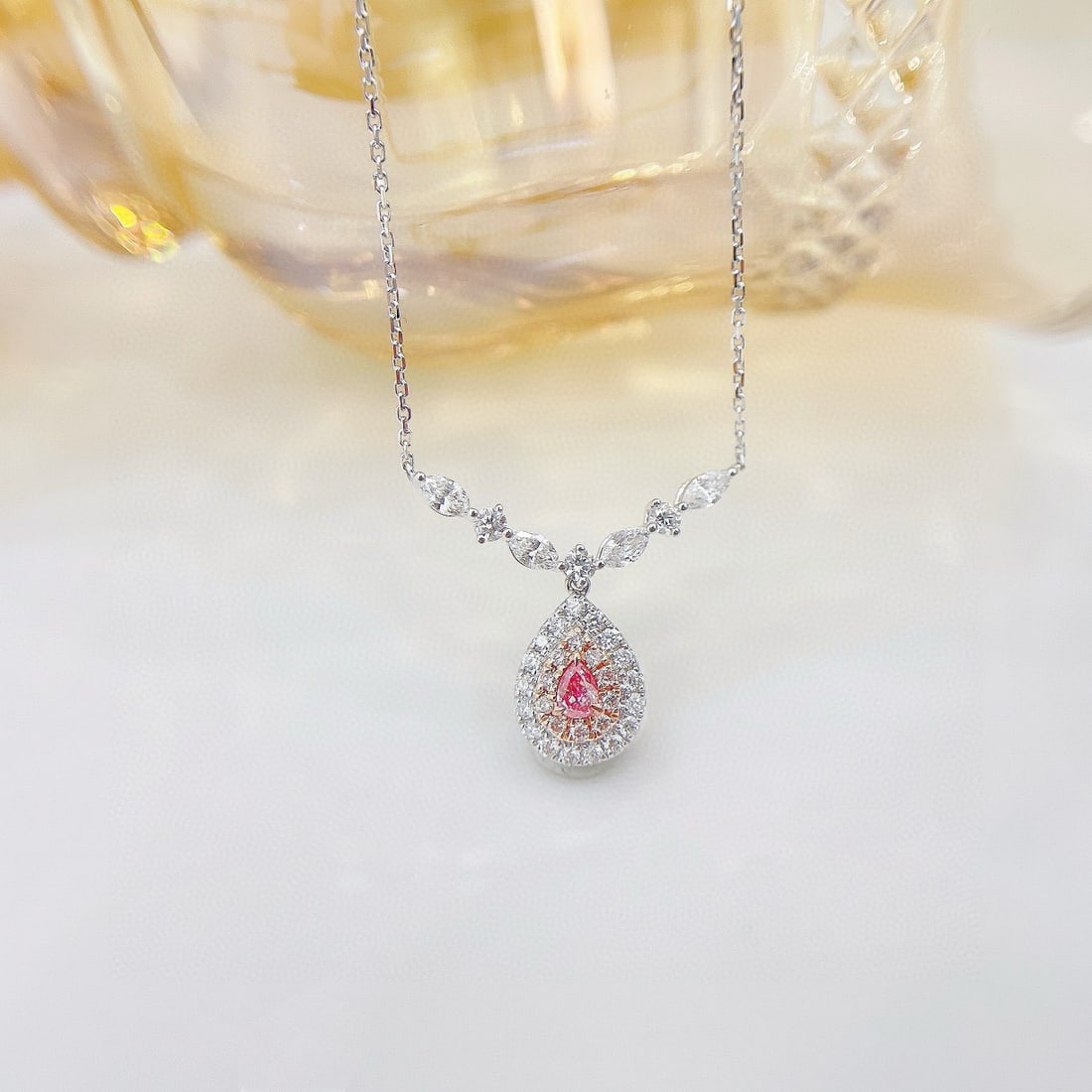 14k Gold 0.59 Ctw Natural Pink Diamond & Diamond Necklace: Ref:231078323 // gold content:14k gold // main gemstone:pink diamond // shape:pear // carat weight:0. 09ct // color:pink // treatment:natural // // adjacent gemstone 2 : diamond // shape:multiple
