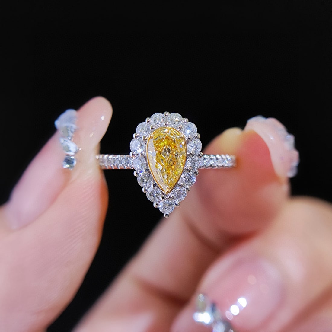 14k Gold 0.91 Ctw Natural Yellow Diamond & Diamond Ring: Ref:231078401 // gold content:14k gold // ring size:7. 25us // // main gemstone:yellow diamond // shape:pear // carat weight:0. 50ct // color:yellow // treatment:natural // // adjacent gemstone 2