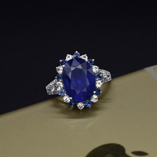 14k Gold 5.34 Ctw Natural Sapphire & Diamond & Sapphire Ring: Ref:231079023 // gold content:14k gold // ring size:7. 25us // // main gemstone:sapphire // shape:oval // carat weight:5. 06ct // color:blue // treatment:natural // // adjacent gemstone 2 :