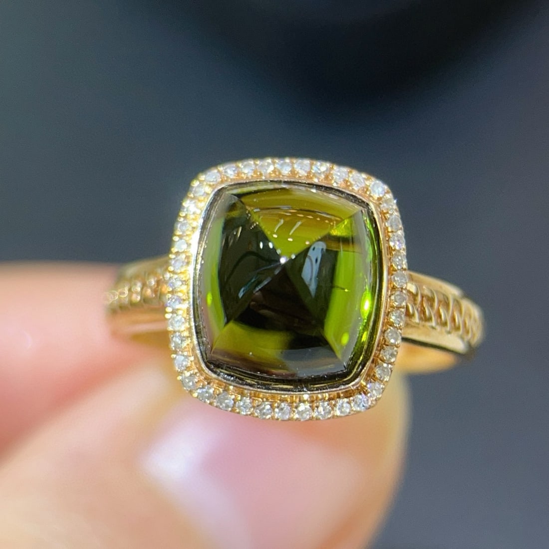 14k Gold 5.71 Ctw Natural Tourmaline & Diamond Ring: Ref:231079087 // gold content:14k gold // ring size:7. 25 us // // main gemstone:tourmaline // shape:sugar-loaf // carat weight:5. 51ct // color:green // treatment:natural // // adjacent gemstone